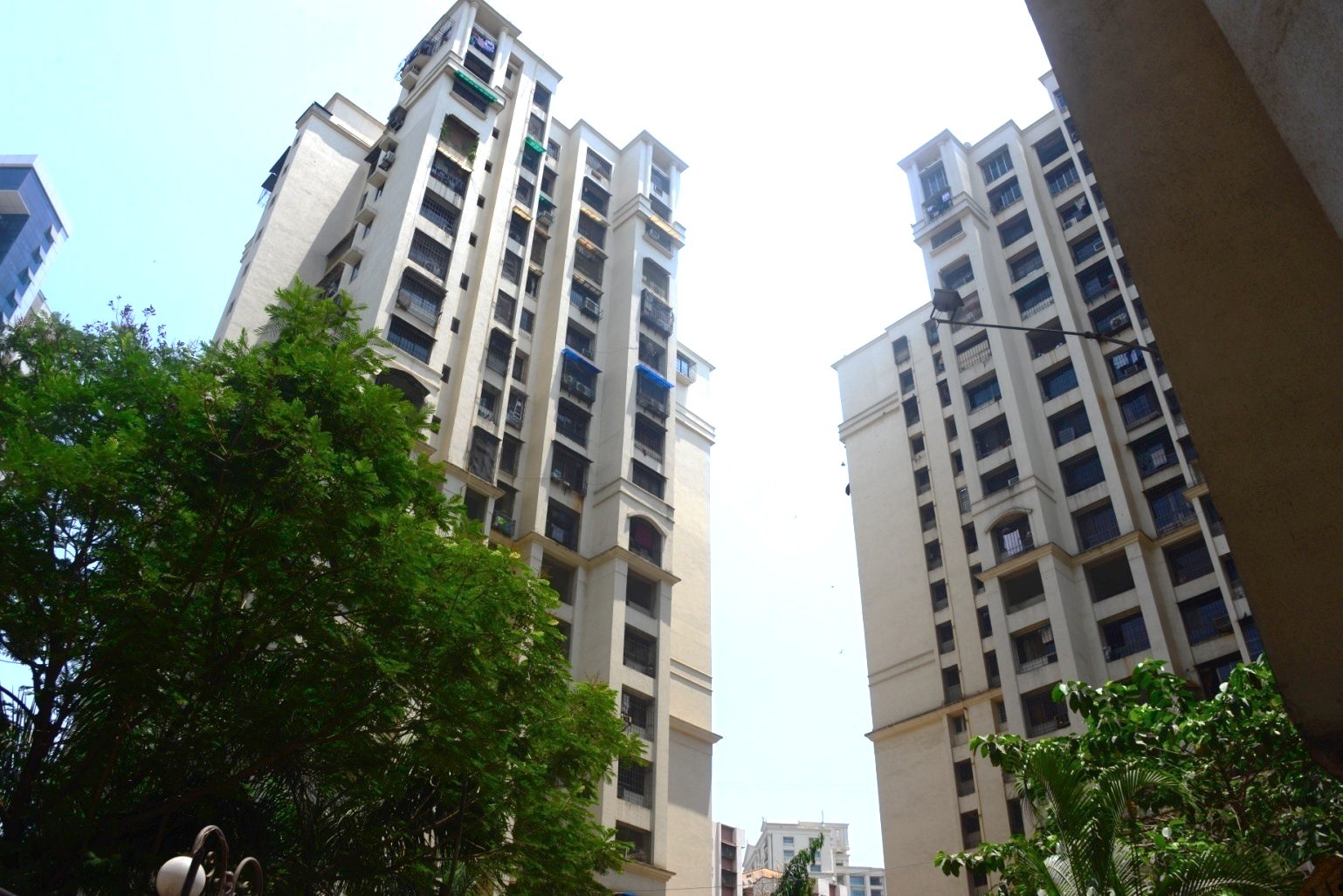 Oberoi Woods CHSL — 3 wings of 35 floors + 3-level basement